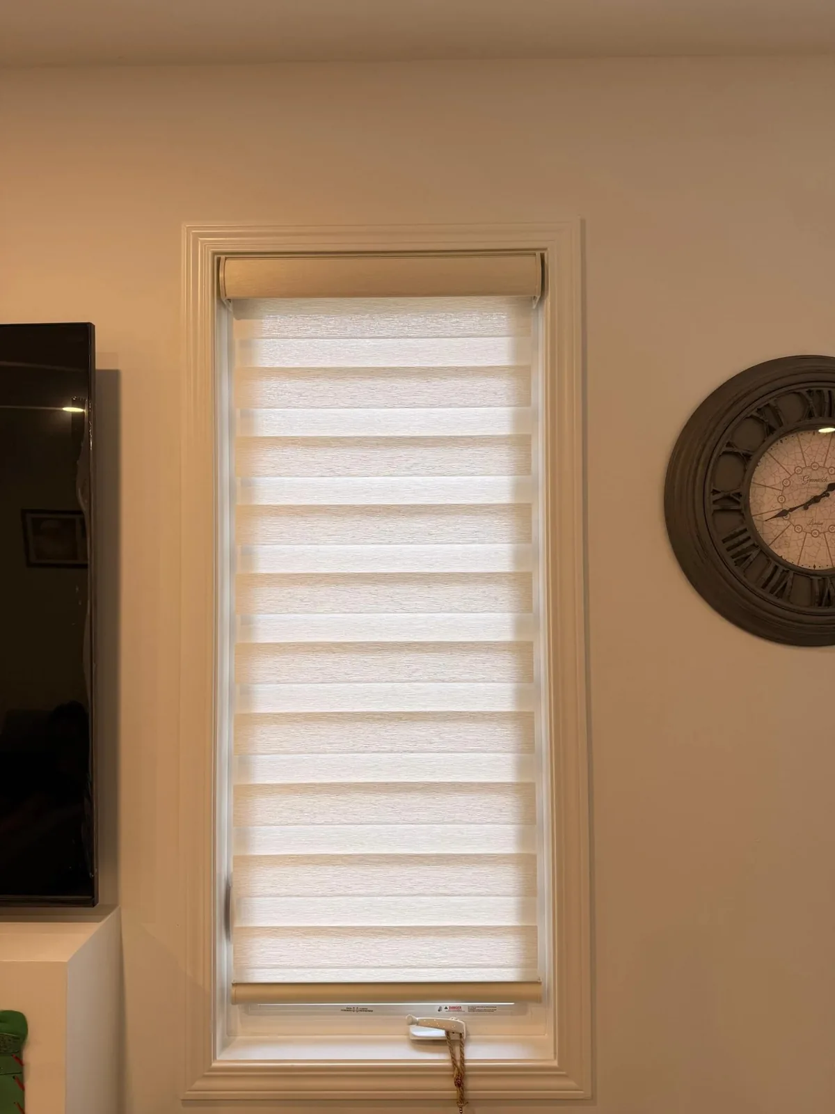 Narrow custom zebra blind installed in a Milton living space